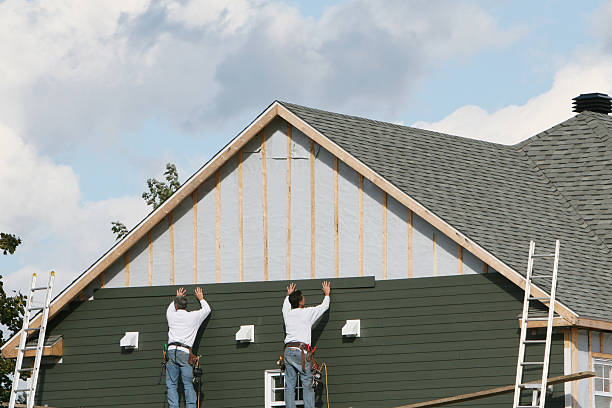 Professional Storm Damage Siding Repair technician working in Lafayette, IN